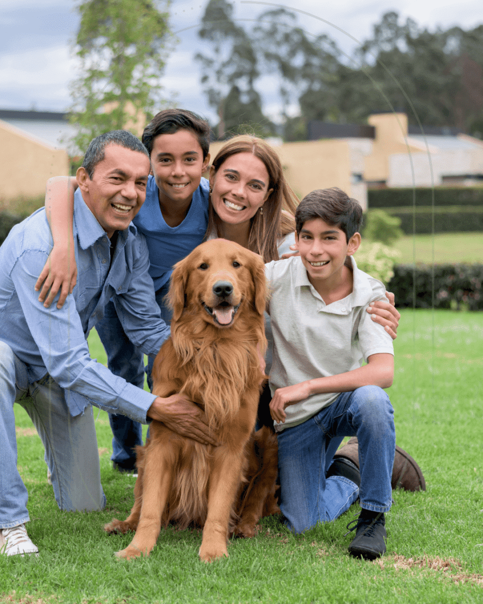 Photo of a happy family with their dog